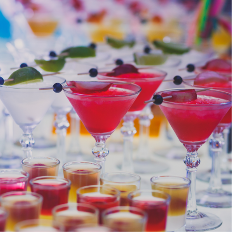 Colorful drinks on a table.